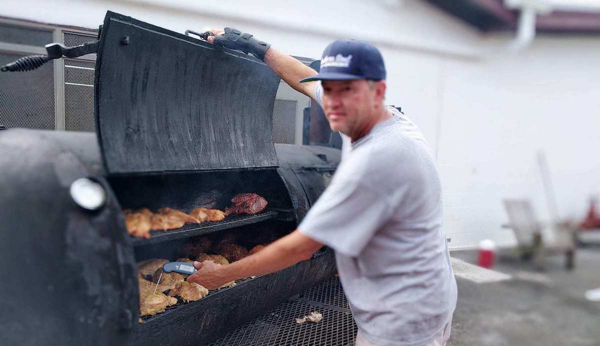 Davis Love III cooking on a Lang